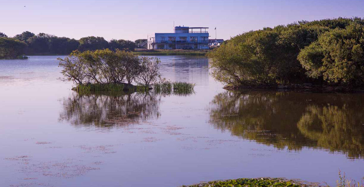 Clubhouse across Sinah Lake